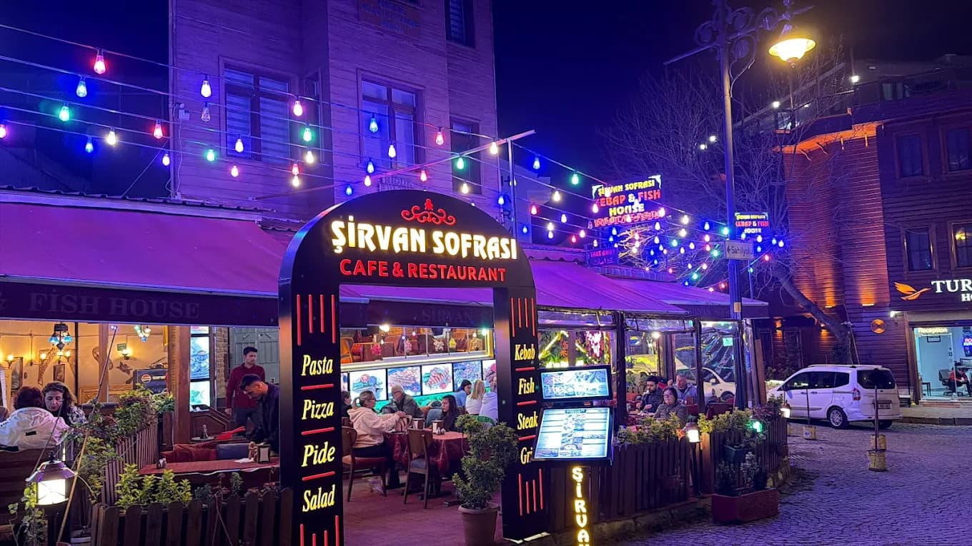 A table prepared with traditional Turkish dishes at Şirvan Sofrası