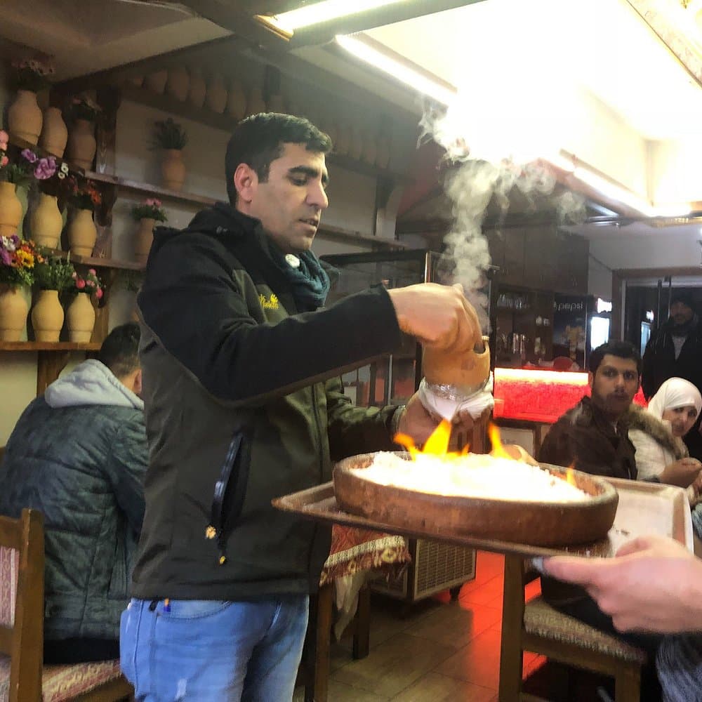 Chef preparing traditional Turkish dishes in the kitchen